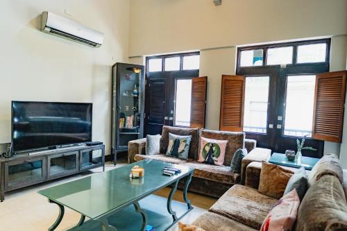 Télévision ou salle de divertissement dans l'établissement La Concordia - Boutique Hotel