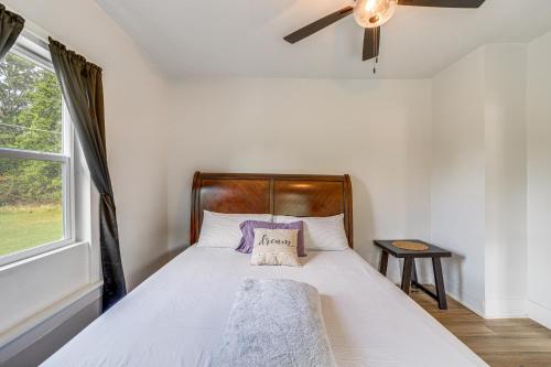 a bedroom with a bed with a pillow on it at McAlester Home with Large Yard and Grill! in McAlester