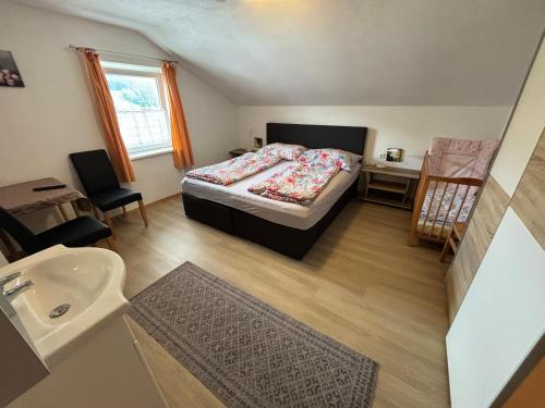 Posteľ alebo postele v izbe v ubytovaní Ferienhaus Dankl