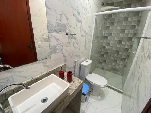 Ein Badezimmer in der Unterkunft Pousada Ninho da Coruja