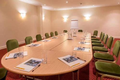 a large conference room with a long table and chairs at Best Western Andover in Andover