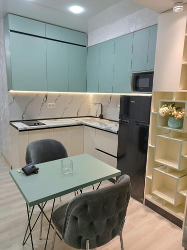 Una cocina o cocineta en Avenue Star