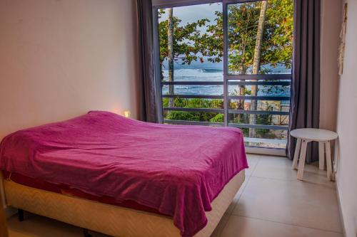 Ένα ή περισσότερα κρεβάτια σε δωμάτιο στο C7, Casa Vibrante, Pé na Areia de Maresias