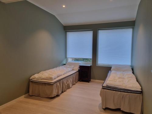 En eller flere senge i et værelse på Sognefjord seaview