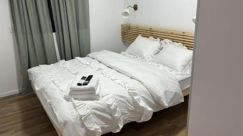 Ένα ή περισσότερα κρεβάτια σε δωμάτιο στο Balcony Bliss Escape