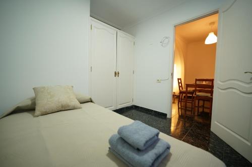 Postel nebo postele na pokoji v ubytování La Casa de la Playa