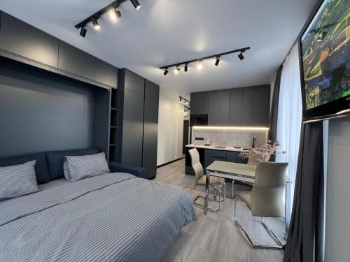 Кровать или кровати в номере Apartments VIP AVALON