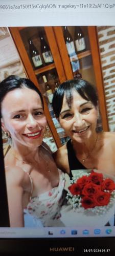 two women are posing for a picture in a photograph at Archontiko Art Hotel in Galaxidhion