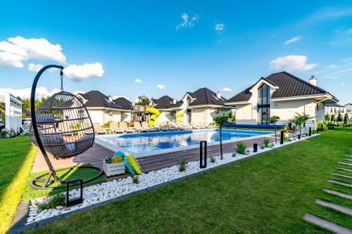 Πισίνα στο ή κοντά στο Family Resort Ustka - Domki dwupoziomowe z basenem