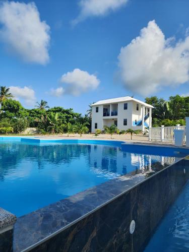 Bella Villa room with large pool and close to beach
