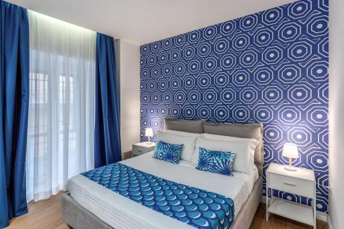 Ένα ή περισσότερα κρεβάτια σε δωμάτιο στο Nibla's Room Napoli