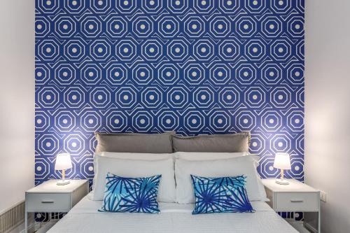Ένα ή περισσότερα κρεβάτια σε δωμάτιο στο Nibla's Room Napoli