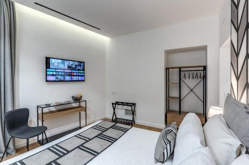 Ένα ή περισσότερα κρεβάτια σε δωμάτιο στο Nibla's Room Napoli