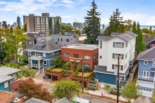 an aerial view of a city with houses at The Dreadfort's Flayed Chamber Bolton's Suite in Seattle