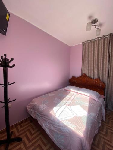 Ένα ή περισσότερα κρεβάτια σε δωμάτιο στο Htl El Senorial II Chacrara