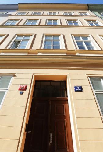 a building with a door in front of it at Greg Apartments Kampa Prague in Prague