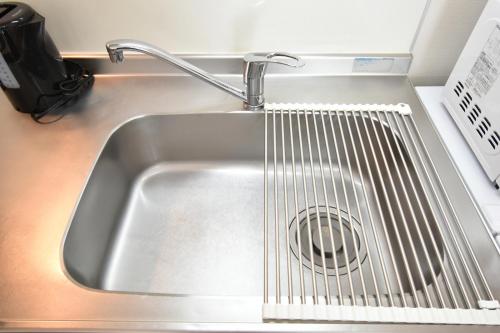 東京にあるKamata332 蒲田駅の2LDKアパートメント 羽田8min 品川8minの金属流しの排水口