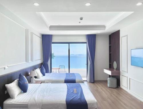 Katil atau katil-katil dalam bilik di FLC Sea Tower Quy Nhơn_Căn Hộ 5 Sao Cạnh Biển_HC Apartment