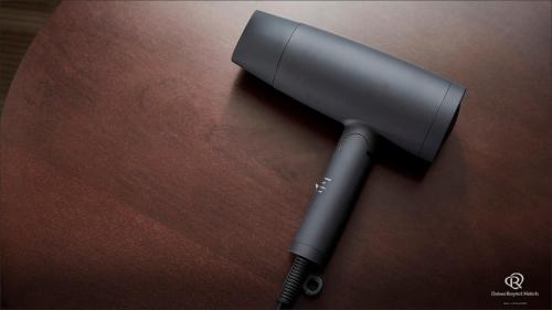 a black pen sitting on top of a table at Daiwa Roynet Hotel Yokohama-Koen in Yokohama
