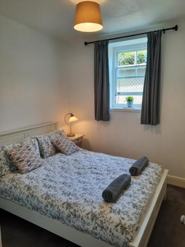 Katil atau katil-katil dalam bilik di Cosy Apartment Central Bath