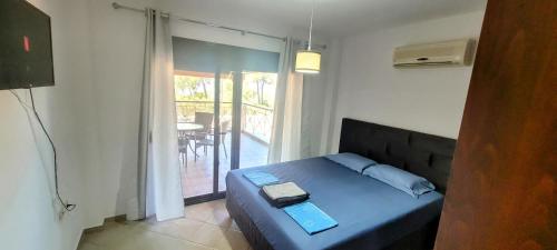 Postel nebo postele na pokoji v ubytování Villa-Alpha