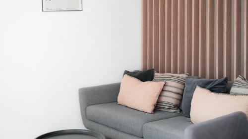 Zona de estar de Aurora Suite à Champel avec terrasse