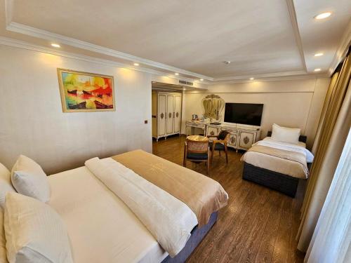 Katil atau katil-katil dalam bilik di Almadina Hotel Istanbul