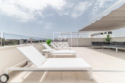 Amanecer Signature Penthouse - high-end rooftop terrace - by OYOOSTAYS
