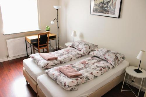 Postel nebo postele na pokoji v ubytování G18 Apartment