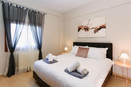 Postel nebo postele na pokoji v ubytování Nova Sea View Apartment Seafront