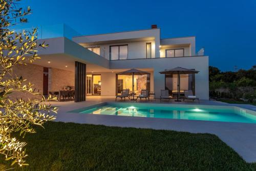 Design Villa Emily White with Seaview near Rovinj