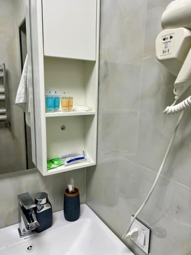 a bathroom with a sink and a shower at Luxury Villa in Ismayilli in İsmayıllı