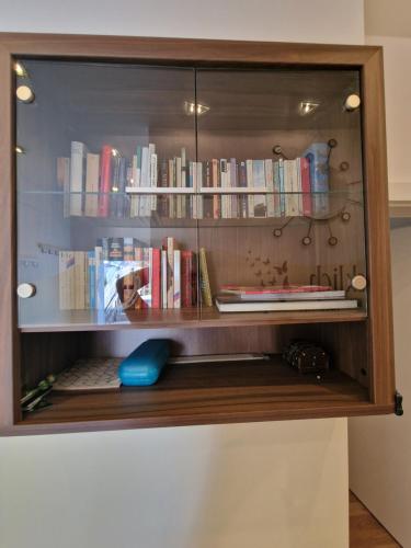 a book shelf with many books on it at Haus Brenner Weiz in Weiz