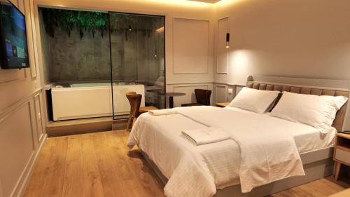 Ένα ή περισσότερα κρεβάτια σε δωμάτιο στο Dream Place Hotel