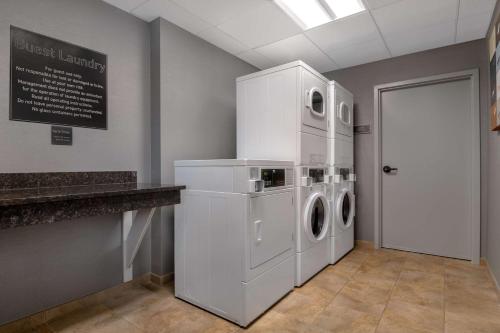 a laundry room with a washer and dryer at Homewood Suites by Hilton Billings in Billings