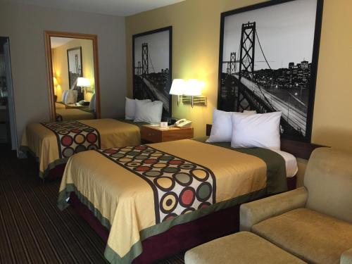 מיטה או מיטות בחדר ב-Rest Inn ATLANTIC CITY GALLOWAY