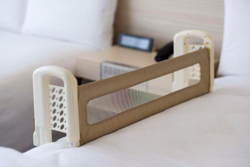 a close up of a bunk bed in a room at DoubleTree by Hilton Okinawa Chatan Resort in Chatan