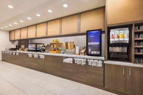 a grocery store with a counter with at Home2 Suites Livingston Yellowstone in Livingston