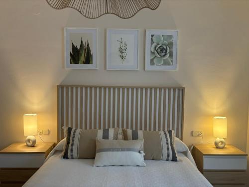 En eller flere senge i et værelse på Apartamento RondaSueña Centro