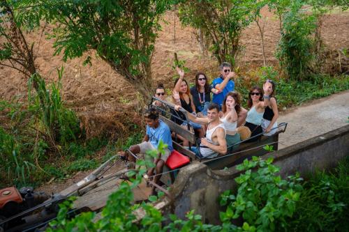 a group of people riding on an elephant ride at Sigiriya Cottage in Sigiriya