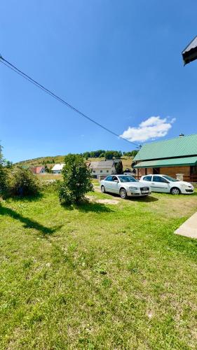a group of cars parked in a parking lot at WIZARD APARTMENT in Žabljak