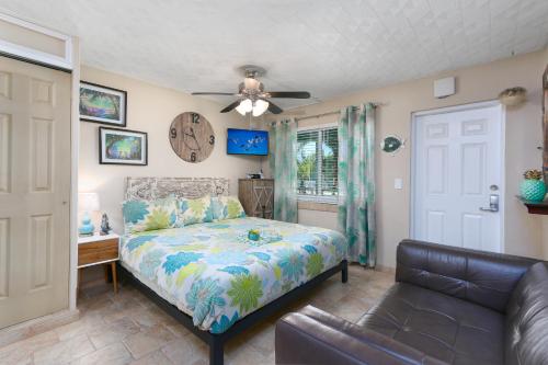 En eller flere senge i et værelse på Tropic Terrace