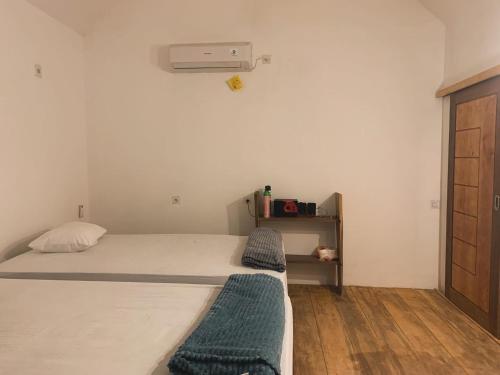 Ένα ή περισσότερα κρεβάτια σε δωμάτιο στο Lances surf camp