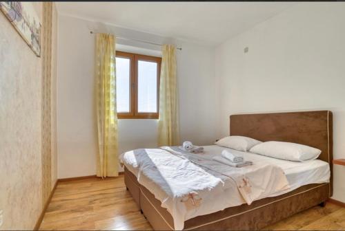 Ένα ή περισσότερα κρεβάτια σε δωμάτιο στο Villa Sofija