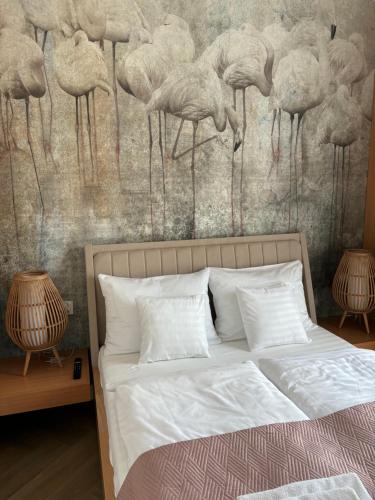 Postel nebo postele na pokoji v ubytování Resort Jantar