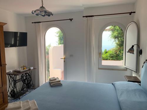 Postel nebo postele na pokoji v ubytování Casa Blu