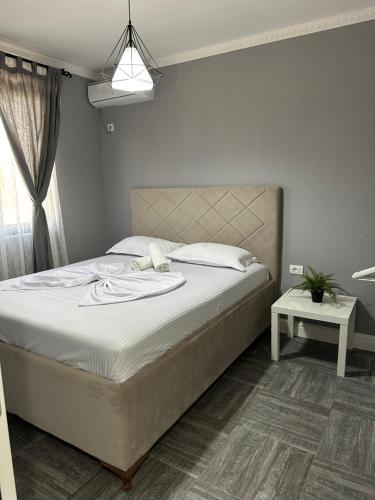 Postel nebo postele na pokoji v ubytování L&A Luxury Apartments