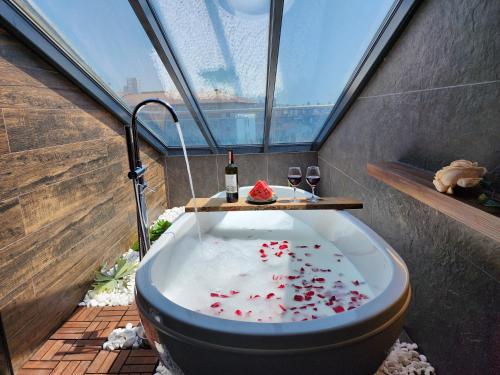 a bathroom with a bath tub filled with blood at Dream house 22 in Istanbul