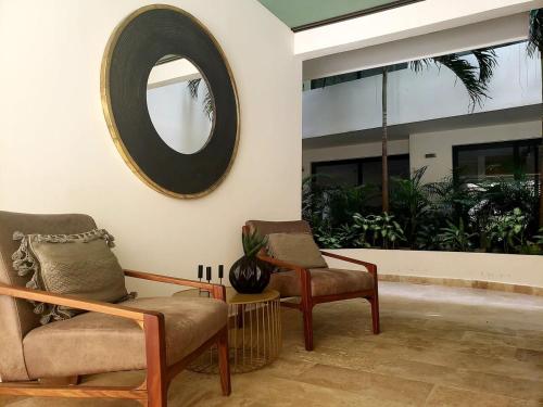 Et sittehjørne på Bahay Condo Chic design Equipped fast Wifi