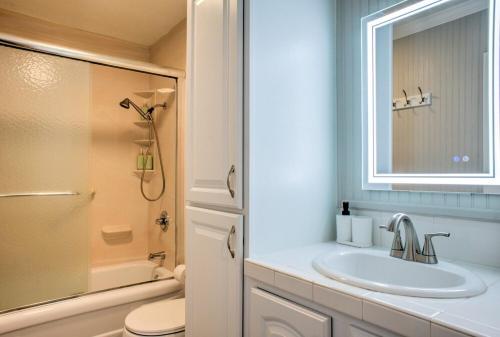 a bathroom with a sink and a toilet and a shower at The Peaceful Fox - Relaxing Retreat in Asheville - Family in Waynesville